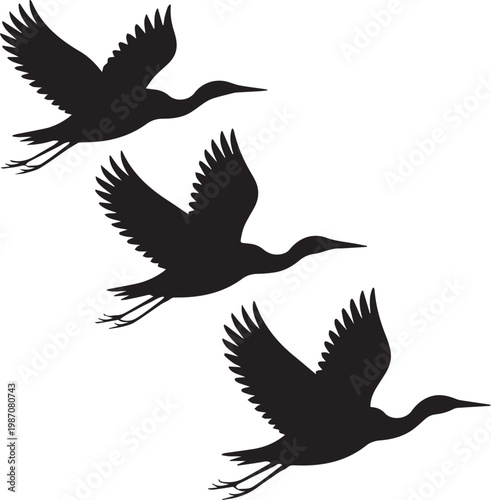 Three elegant silhouettes of cranes in graceful flight formation against a plain background.