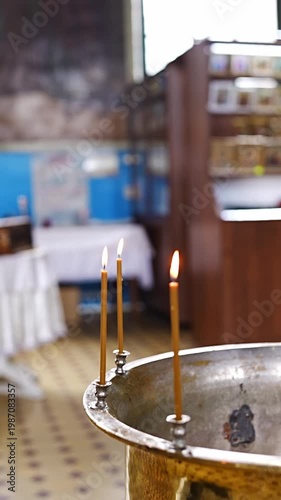 Ceremony of baptism with candles in a church setting