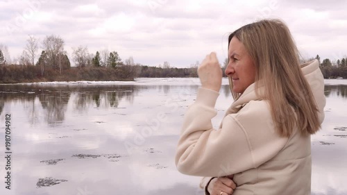 Melting spring ice on lake surface ice reflects climate change awareness and fragile ecosystem balance Ice dissolving highlights warming impact nature transformation ice signals global change