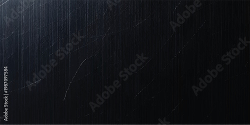 Abstract dark blue background with rays and a textured grunge pattern on an old vintage wall backdrop