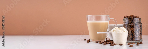 фотографія Protein coffee, whey isolate latte drink with whey protein powder in scoop and c