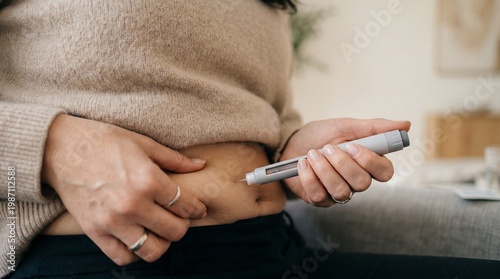 Close up of woman injecting medication into abdomen, weight loss concept, glp 1 therapy, medical treatment.