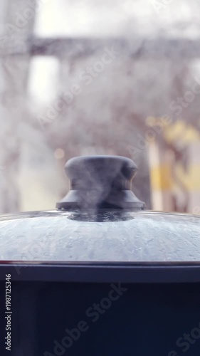 Steam from a cooking pot outdoors in slow motion