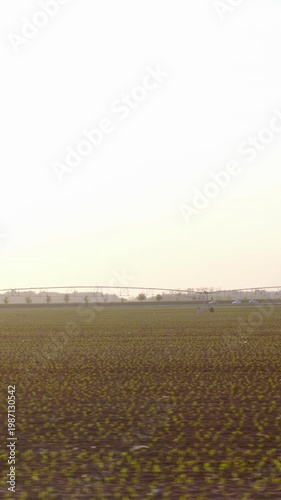 Driving beside the countryside big farmland in spring