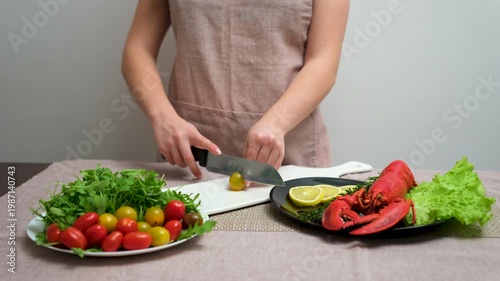 Healthy food preparation slicing yellow tomato vitamins nutrition diet fresh ingredients kitchen