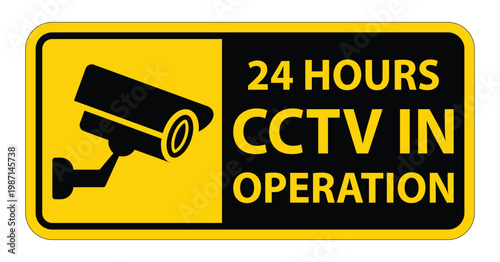 Yellow and Black Sign Indicating CCTV Surveillance in Effect All Day