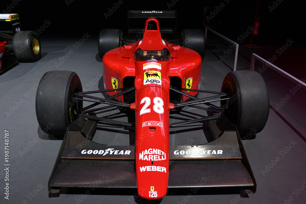 Fototapeta premium Scarperia, Italy - October 24th 2025: Ferrari 642 or F1-91 ex Alain Prost and Jean Alesi on display during Ferrari World Finals 2025 at Mugello Circuit in Italy.