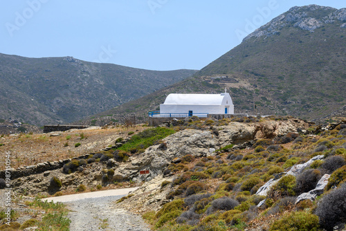 A Greek chapel seen from Moundoulia Hill, above the port of Katapola. Amorgos Island, Cyclades, Greece