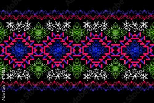 Colorful ethnic geometric pattern with blue, pink, green, and white pixel-style motifs on a black background. Inspired by traditional tribal textiles and digital art fusion design.