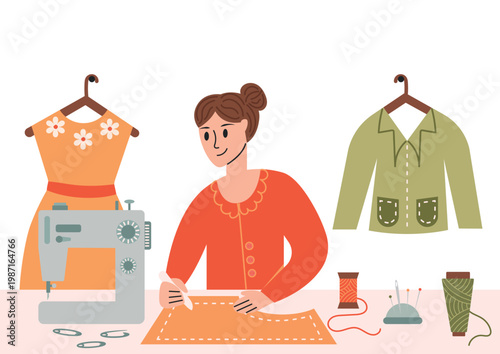 Woman dressmaker working at home workshop with sewing machine.