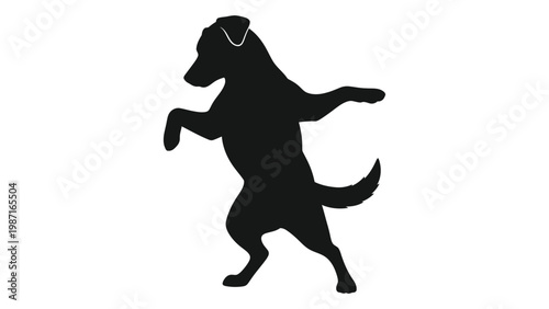 A black silhouette of a labrador playfully rearing up on its hind legs