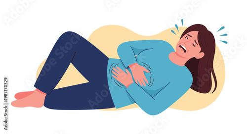 Young woman in a blue shirt is lying on the ground and clutching her stomach with a painful expression and tears in her eyes.