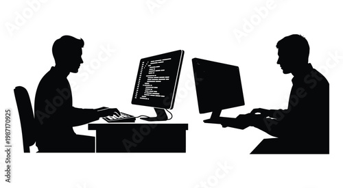 Two people working on separate computer stations with code displayed on the monitor screen display.