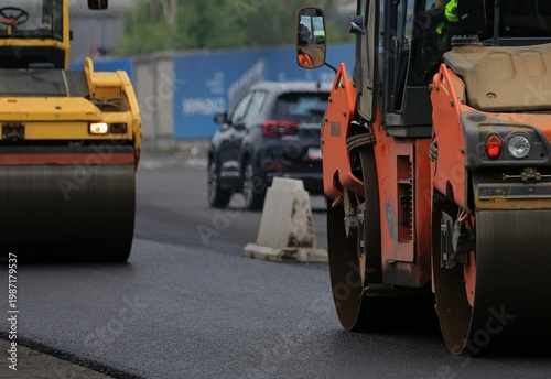 aying asphalt on the highway