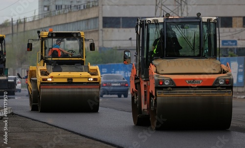 aying asphalt on the highway