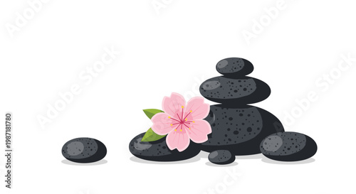 A stack of dark porous volcanic stones arranged in a balanced pyramid is accompanied by a single delicate light pink cherry blossom on white floor.