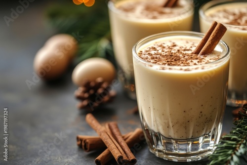 selective focus close up of creamy eggnog in glass with spices
