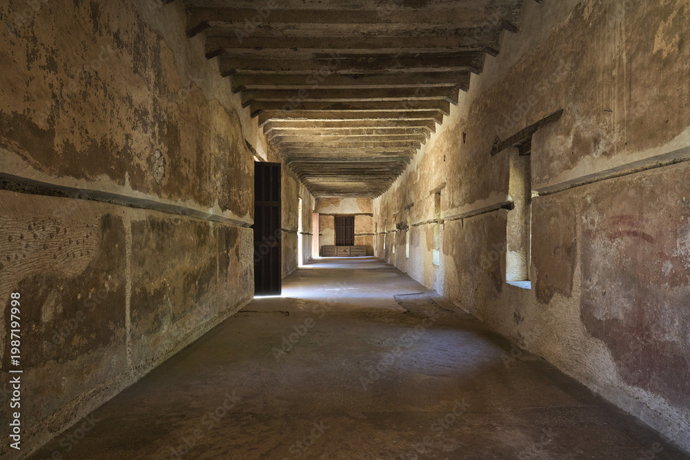 Fototapeta premium Dark corridor at the Royal Enclosure Fasil Ghebbi in Gondar, Ethiopia