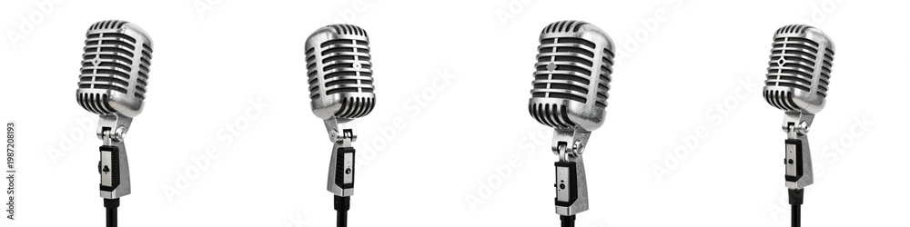Fototapeta premium Four retro style microphones in a row against black backdrop for karaoke or concert