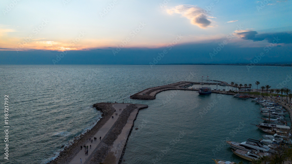 Fototapeta premium Panoramic Sunset View of the Ancient Harbor and Marina in Side, Antalya, Turkey