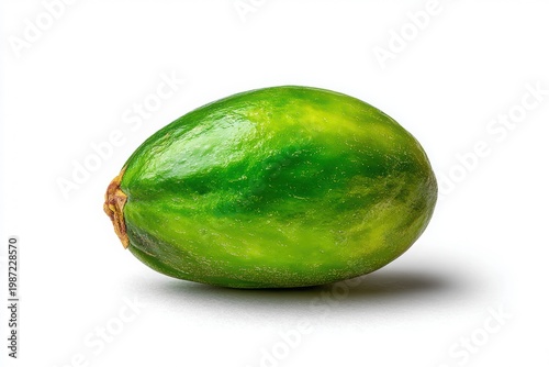 Single green avocado isolated on pure white background with soft diffused lighting and subtle natural shadow, showcasing its smooth texture and vibrant color