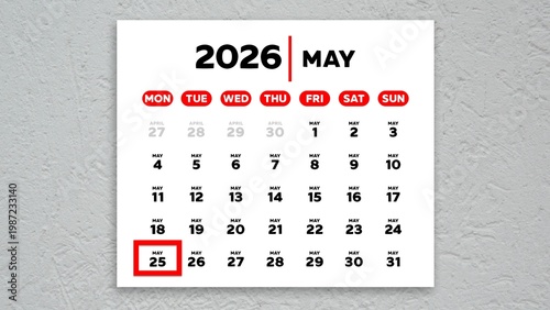 The date May 25th marked with a red cursor on a wall calendar 2026
