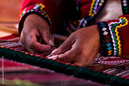 hands weaving incan cloth