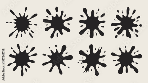 A collection of eight distinct black ink splatters are arranged against a neutral beige background exhibiting varied shapes and sizes high quality professional detailed modern elegant