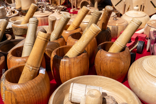 Traditional Wooden Mortar and Pestle Set Displayed at Local Market Handmade Kitchen Tools