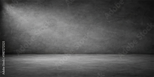 An empty dark room featuring an aged concrete wall with a distressed grunge texture and grey cement flooring creates a vintage urban backdrop for this minimalist interior design space