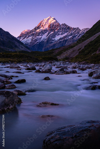 Alpenglow on Mount Cook, the highest mountain in New Zealand, Twilight at Hooker Valley River, in Aoraki or Mount Cook National Park, South Island, New Zealand