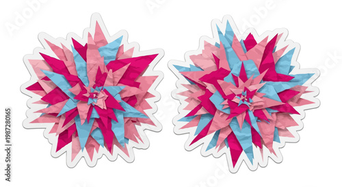 Explosion of pink and blue paper fragments in a geometric pattern