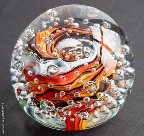 Konstfotografi Glass Paperweight With Hot And Earthy Color Streaks And Lots Of Bubbles