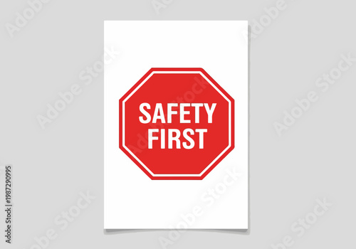 Safety first sign displayed with a clear warning message against a simple background for promoting workplace safety awareness