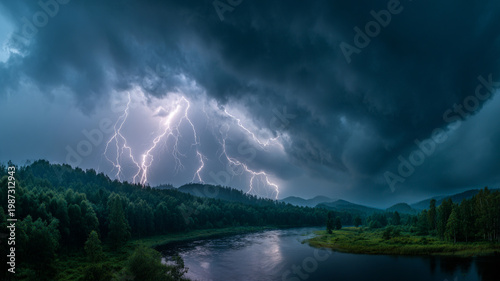 Lightning strikes over dark forest and river.
