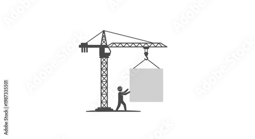 Construction worker operating a crane.