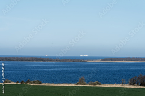 Baltic Sea ferries navigating Am Salzhaff under blue sky
