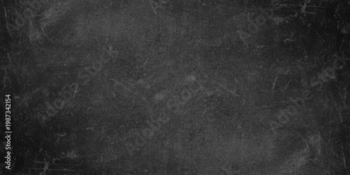 Dark grunge stone texture background with scratches, black slate wall surface for copy space. A dark grunge black chalkboard background, blank grey chalk wall design, vintage surface