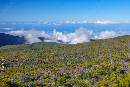 Scenic landscape of Piton de la Fournaise (Peak of the Furnace) 2632m, a shield volcano on the eastern side of Reunion island in the Indian Ocean and one of the most active volcanoes in the world.	