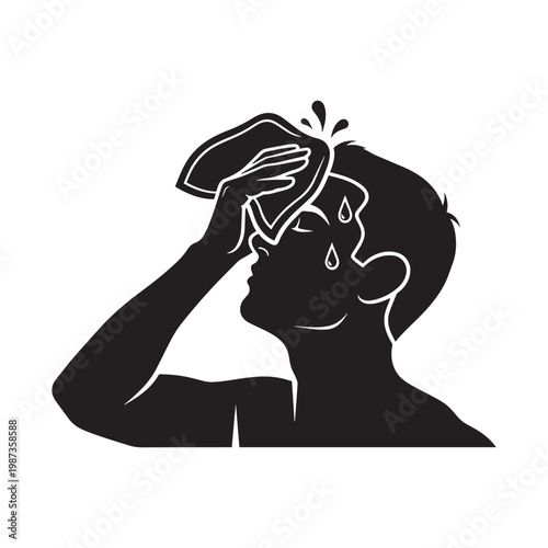 Man wiping sweat from forehead