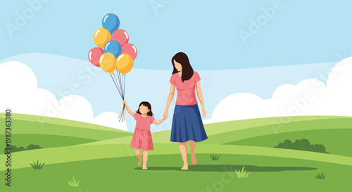 Happy mother and her young daughter walking barefoot through a green grassy field holding a bunch of colorful balloons.