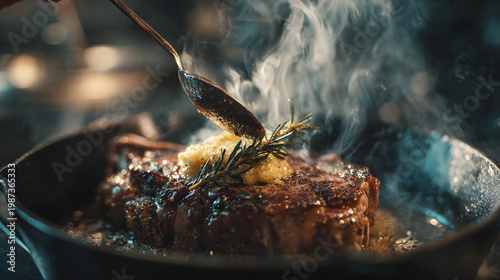 Slow Motion Shot of Chef Using Spoon to Baste Steak with Butter and Fresh Herbs in a Cast Iron Pan