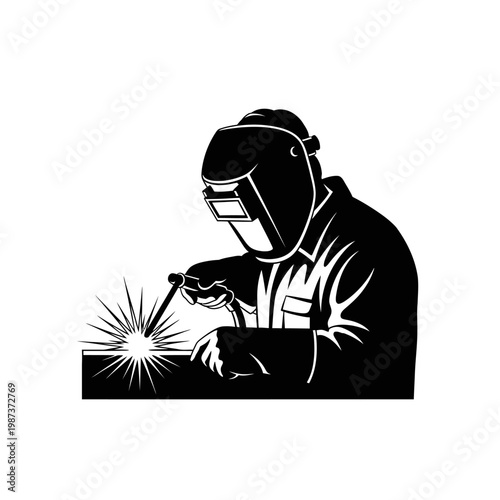 Welder Working with Sparks and Protective Gear