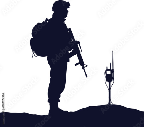 Silhouette of a soldier with rifle standing guard against a bright sky