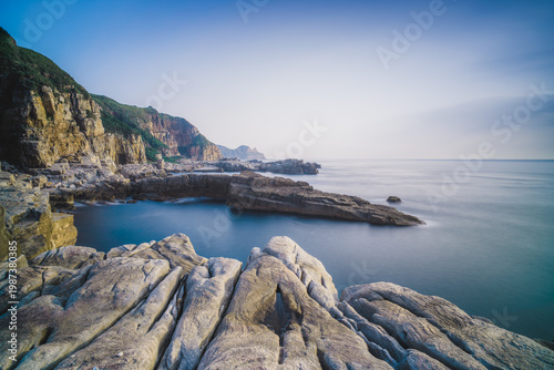 Wallpaper Mural Longdong Bay Cape Coast Landscape - Northeast and Yilan Coast National Scenic Area. Long exposure at dawn, shot in Gongliao District, New Taipei, Taiwan. Torontodigital.ca