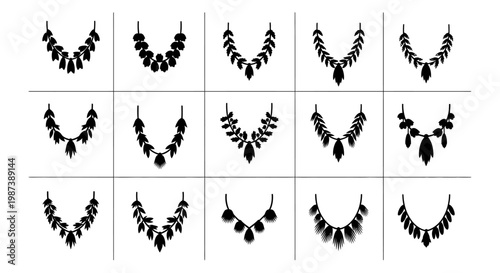 Collection of 12 unique black leaf shaped jewelry necklaces on white background various designs