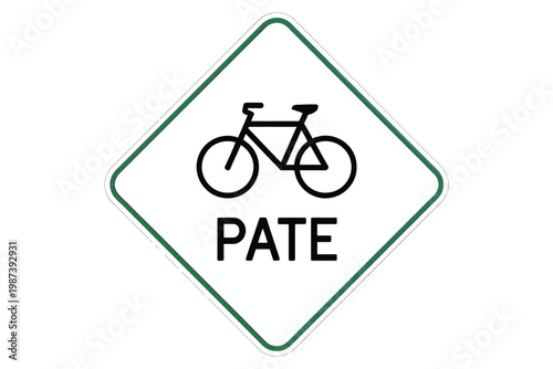 A white sign with a green border indicates a bicycle path or lane for cyclists