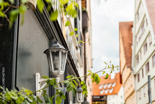European street with vintage lantern and old buildings