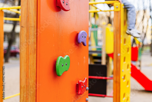 Colorful playground climbing wall detail for children
