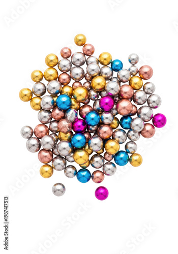 Scattered highly reflective metallic dragées in gold, silver, and magenta, macro close-up flat lay on a high-gloss white studio surface with copy space, festive luxury confectionary concept